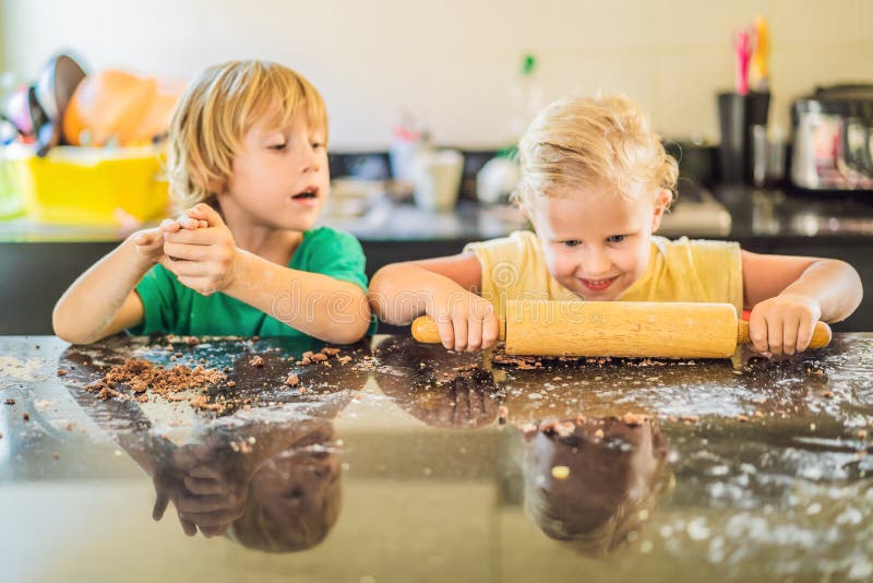 Two Children a Boy and a Girl Make Cookies from Dough Stock Image Image of flour, happy 149495899