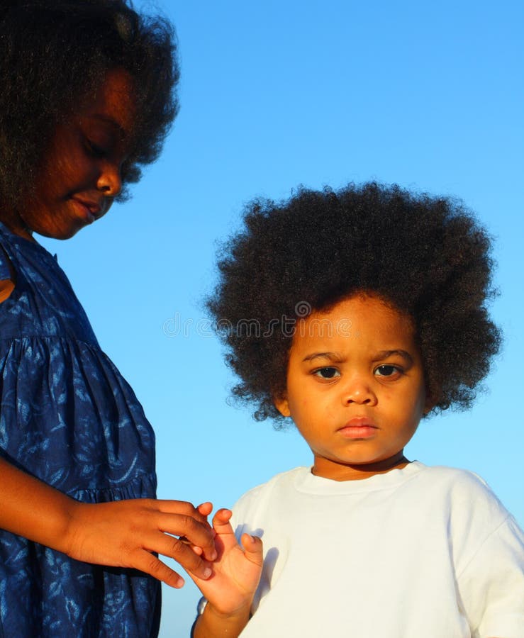 Two Children Holding Hands