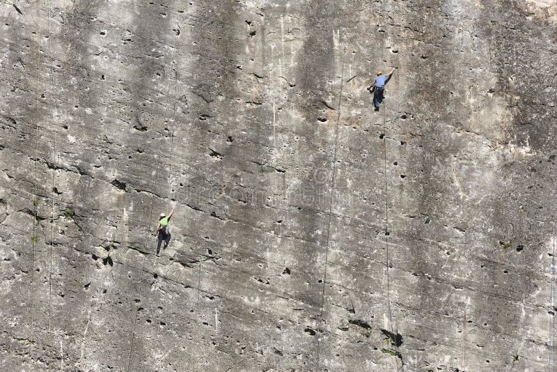Two Climbers on a Granite Wall. Extreme Sport. Outdoor Activity Stock