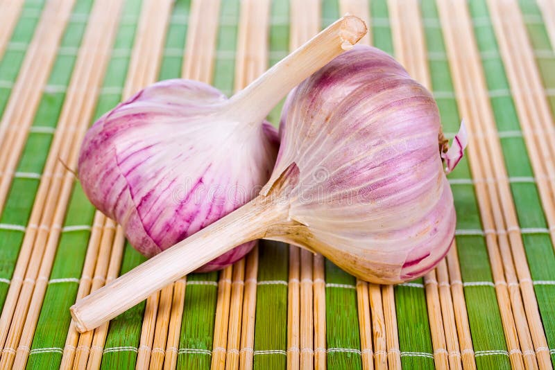 Two cloves of garlic stock image. Image of food, nature 26726809
