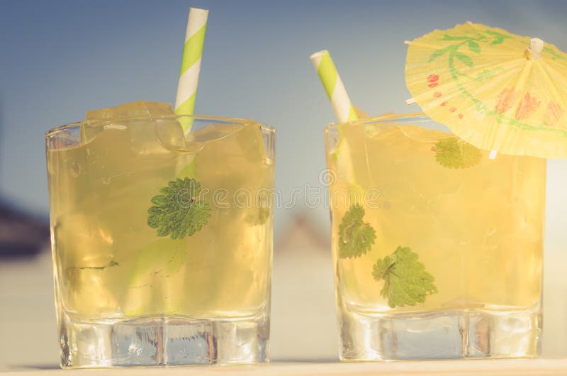 Two cocktails with ice and mint/two cocktails with ice and mint, selective focus