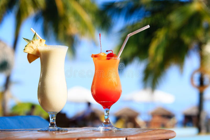 Two cocktails on luxury tropical beach resort. Two cocktails on luxury tropical beach resort