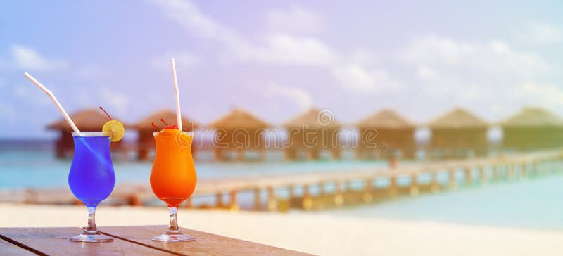 Two cocktails on luxury tropical beach resort