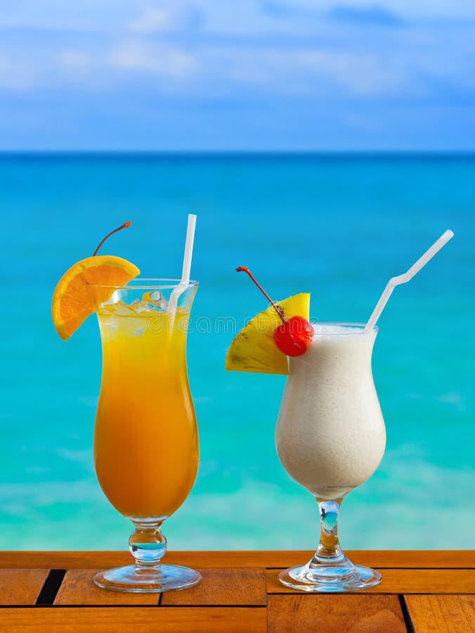 Two cocktails on table at beach cafe