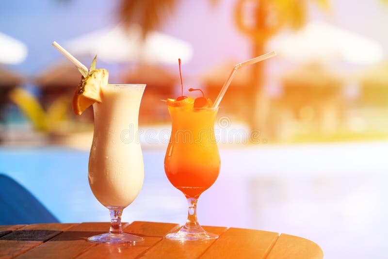 Two cocktails on luxury tropical beach resort. Two cocktails on luxury tropical beach resort