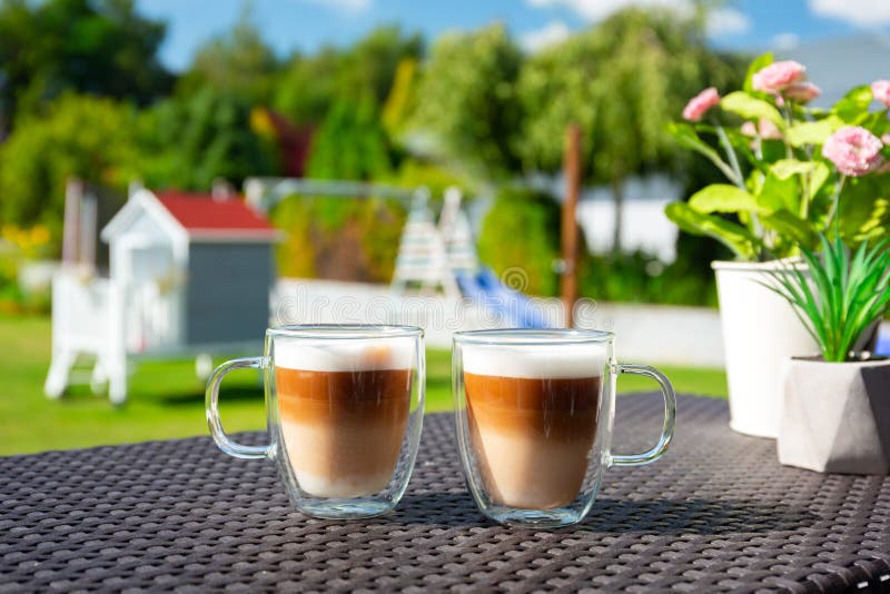 Two Coffees on the Table of Sunny Garden Terrace Stock Image Image of