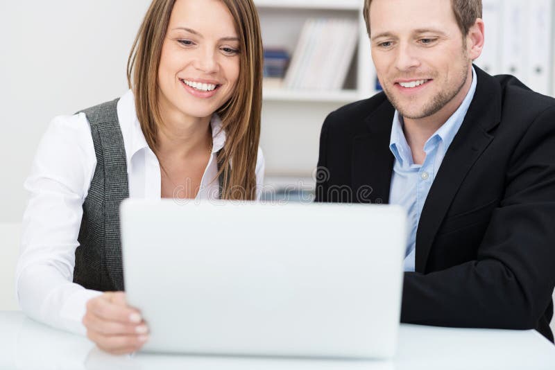 Two colleagues working together in the office royalty free stock photos