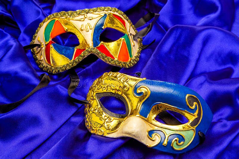 Two Colorful Mardi Gras Masks on Blue Silk Stock Image - Image of good