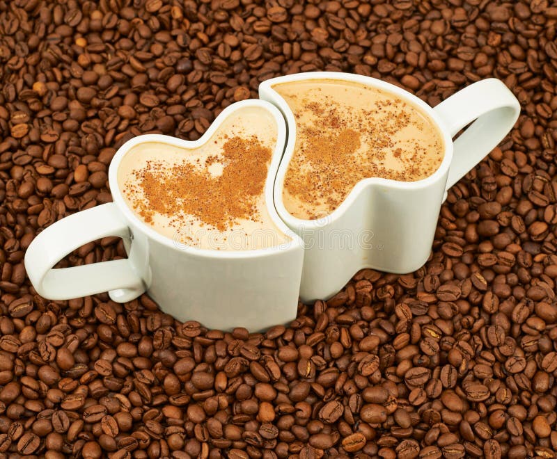 Two cups on coffee beans stock photo. Image of food, aroma 44979930