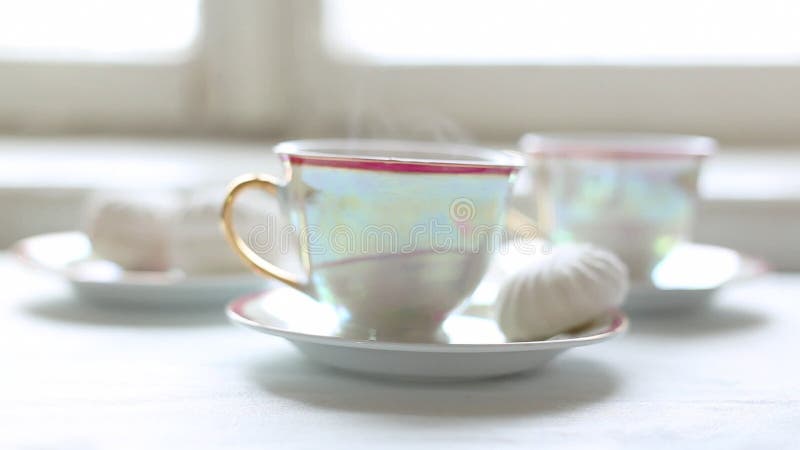 Two cups of hot tea and dessert on the table, Full HD. Hot cafe video