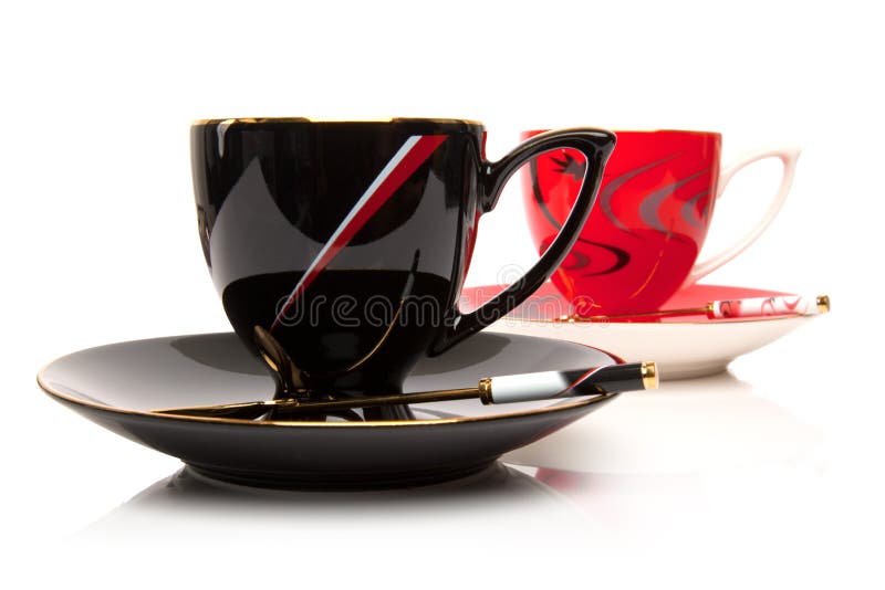 Two cups of tea isolated over white