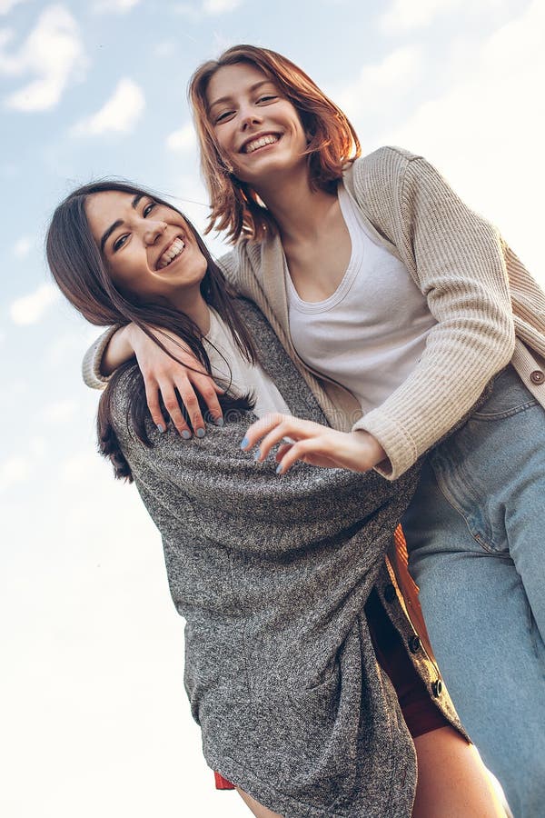 Two Cute Girls Walking Outdoors Stock Image - Image of grass, people ...