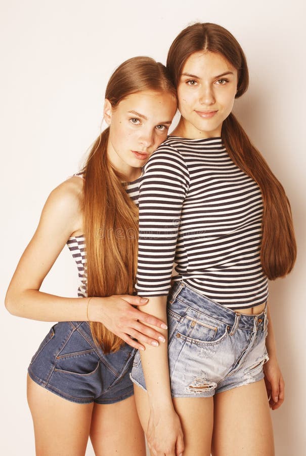 Two Cute Teenagers Having Fun Together Isolated On White Stock Image Image Of Happy Girls 