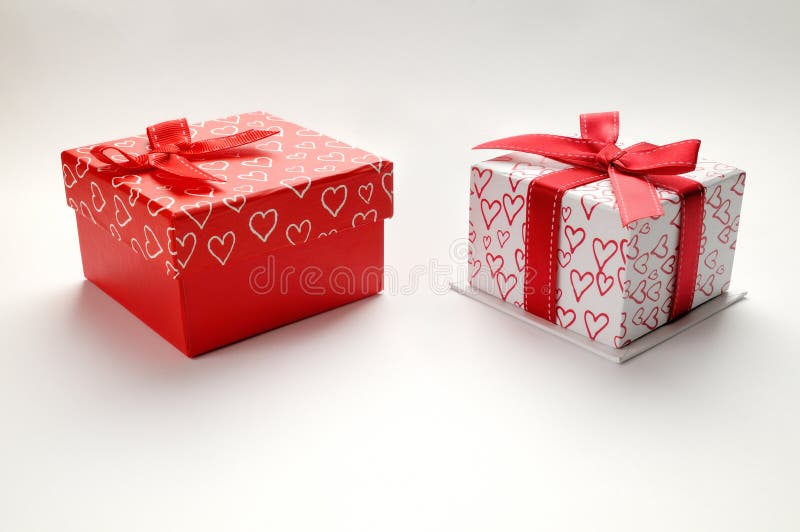 Two Decorative Gift Boxes with Hearts Printed Isolated Top Right Stock