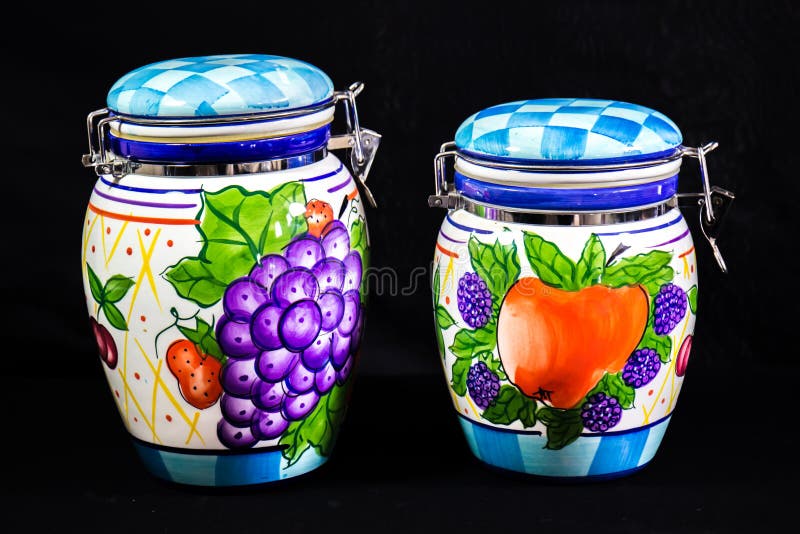 Two Decorative Kitchen Containers with Fruit Painted on Outside Stock