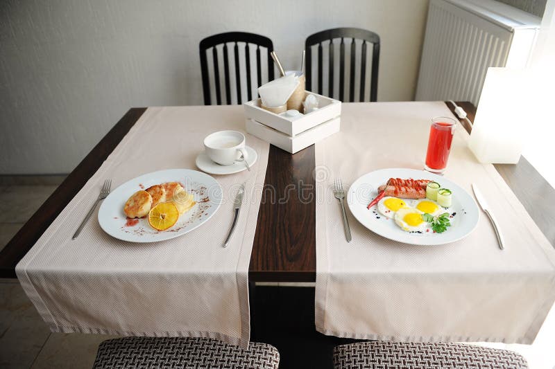 Two Different Breakfasts Are Served In Restornae Cheesecakes And Eggs