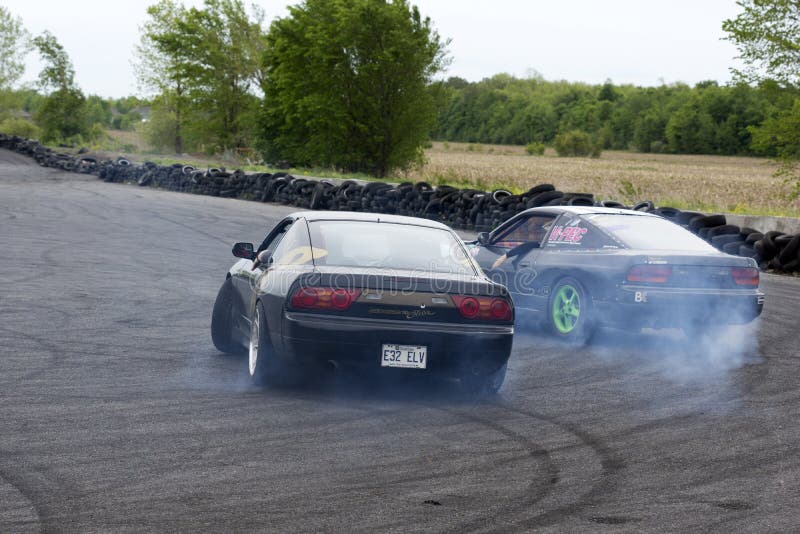 Two drifting cars