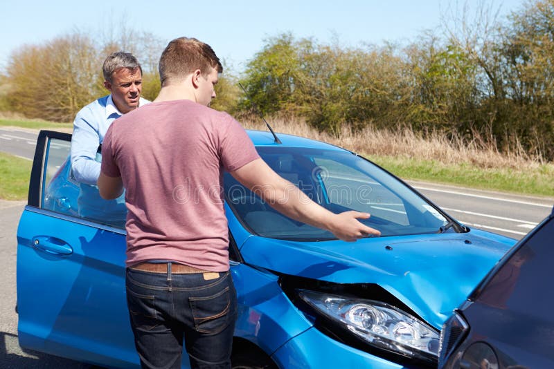 Two Male Drivers Arguing After Traffic Accident