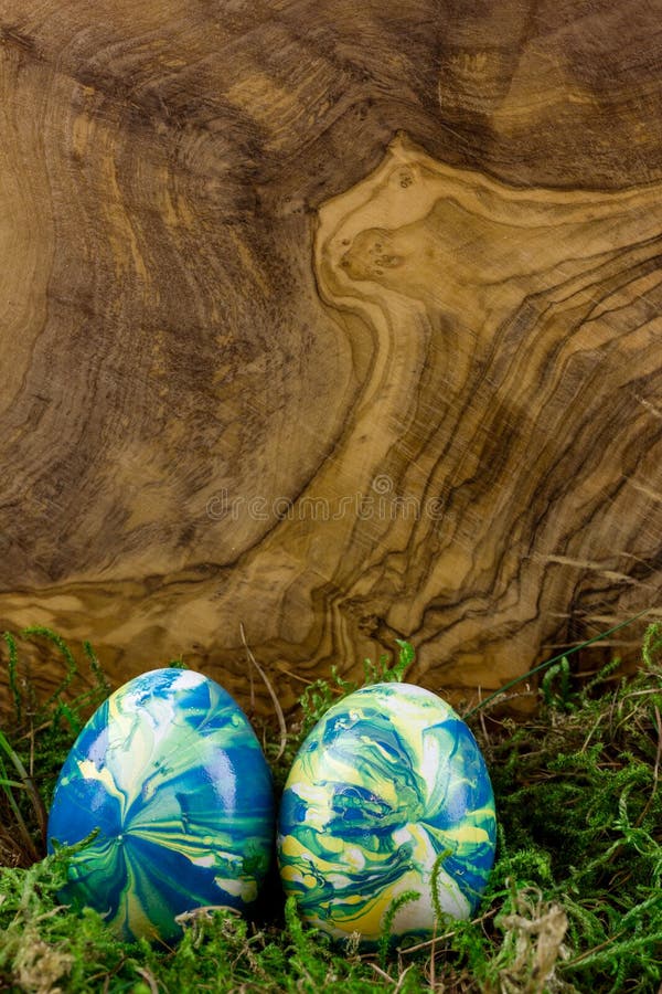 Two Easter Eggs Lying in the Moss Stock Photo - Image of painted