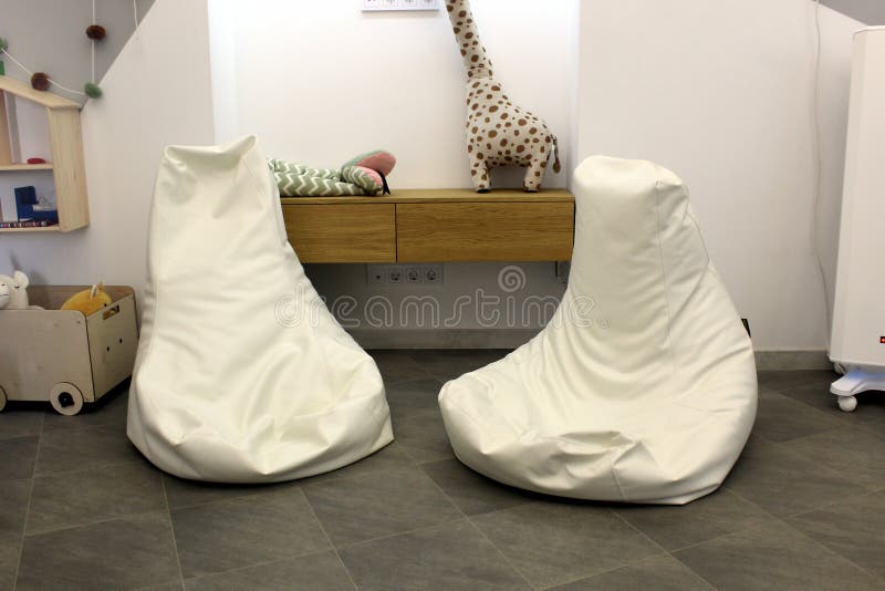 Two Easy Chairs are on the Floor in the Children`s Room. Stock Image Image of pillow, modern