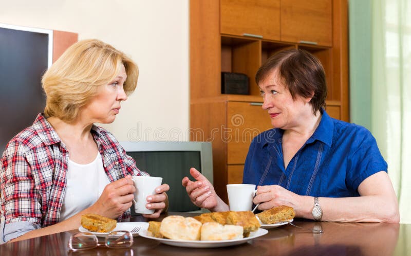 Two Elderly Friends Drink Tea with Cake Stock Photo - Image of aged ...