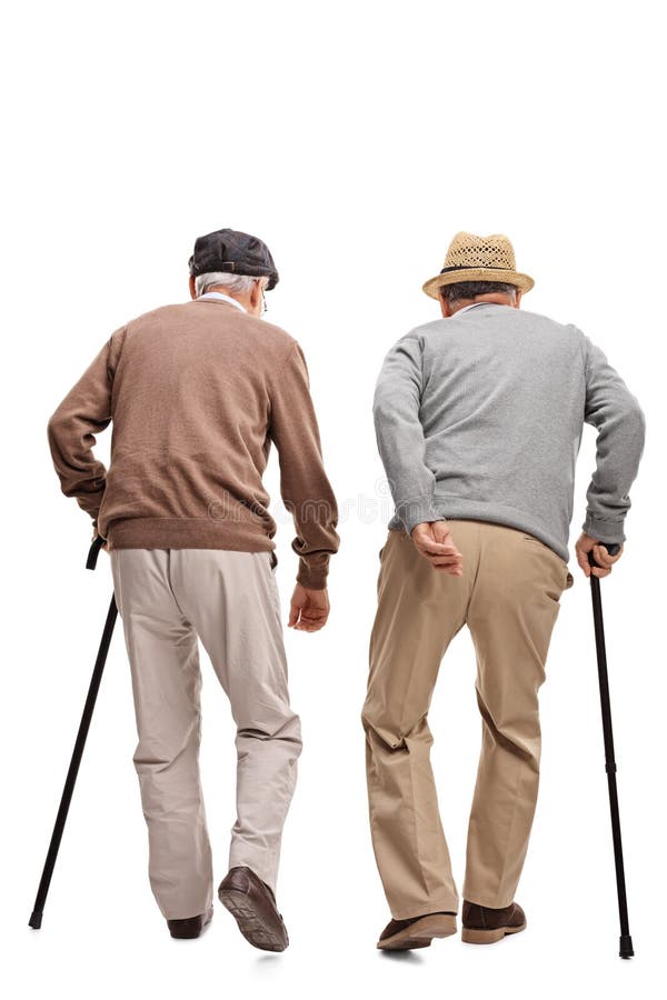 Two elderly people walking with canes isolated on white backgrou