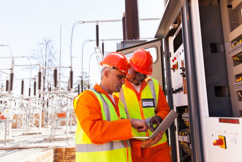 Two electrical engineers stock photography