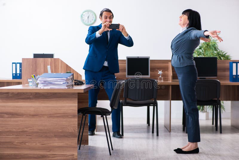 Two Employees Doing Sport Exercises in the Office Stock Image Image
