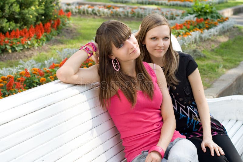 Two female friends on bench