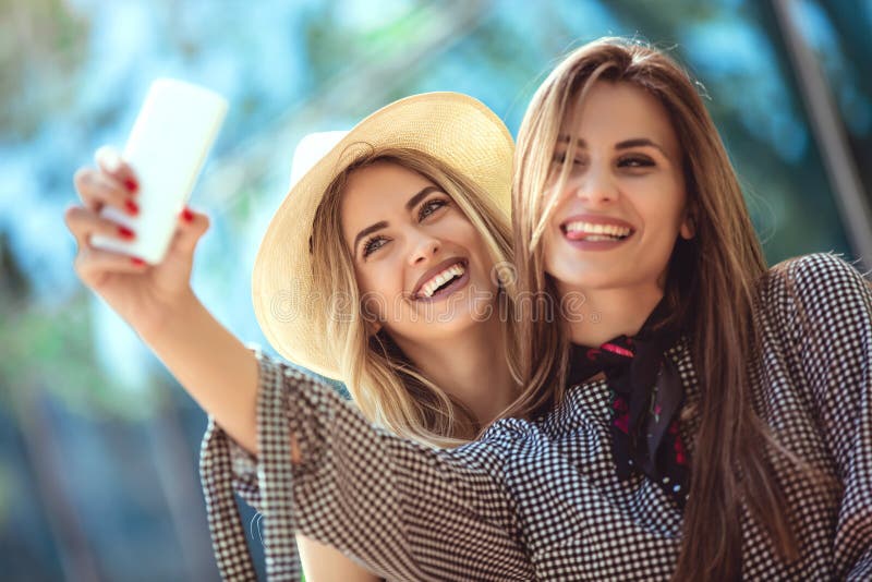 Two Female Friends Taking A Selfies Stock Image Image Of Tourism 