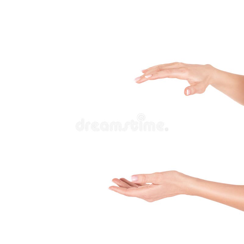 Two female hands holding something invisible between, isolated on white. Free space for product stock photo