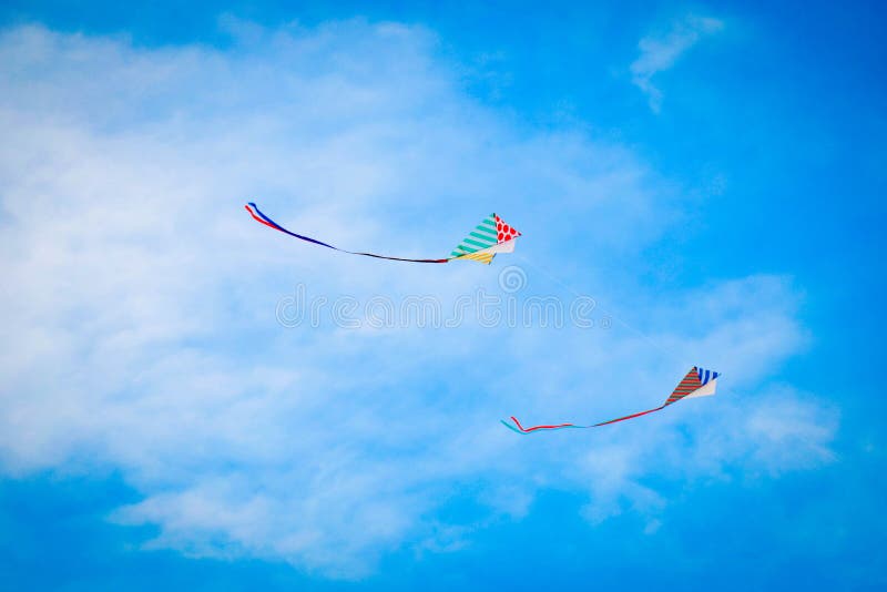 Two Summertime Kites stock image. Image of string, kite 41123323