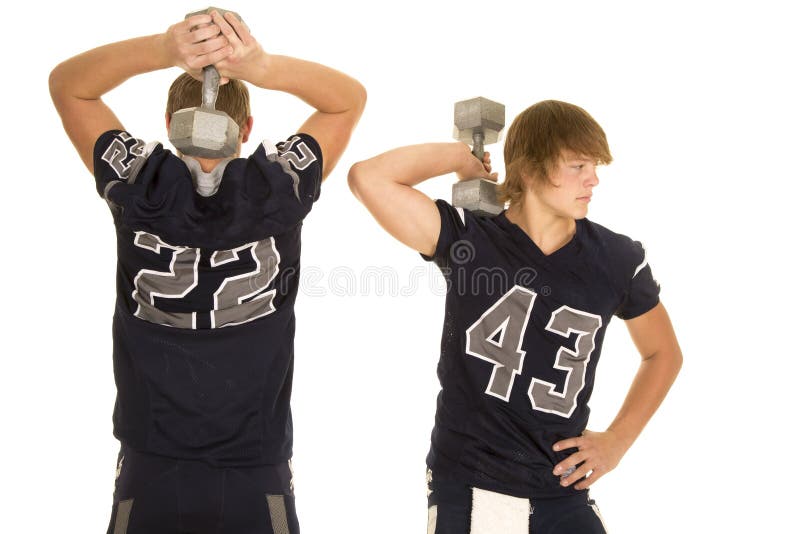 Two football players with weights