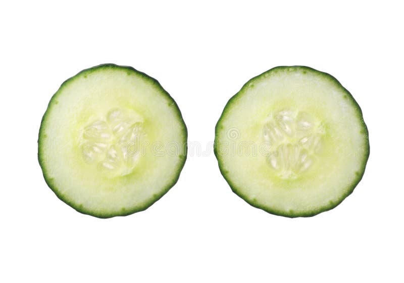 Two fresh cut cucumber slices isolated on white background, close up