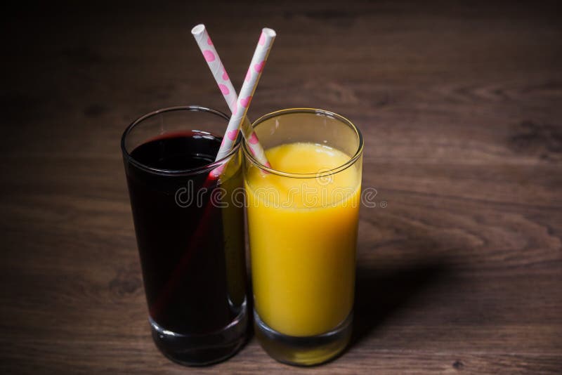 Two Fresh Glasses of Juice with a Straw Stock Photo Image of lemon