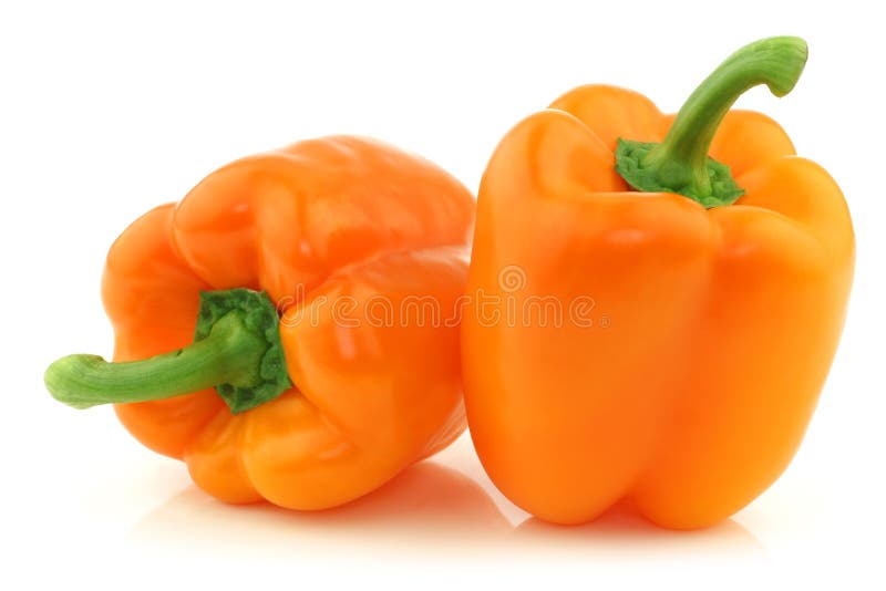 Two fresh orange bell peppers