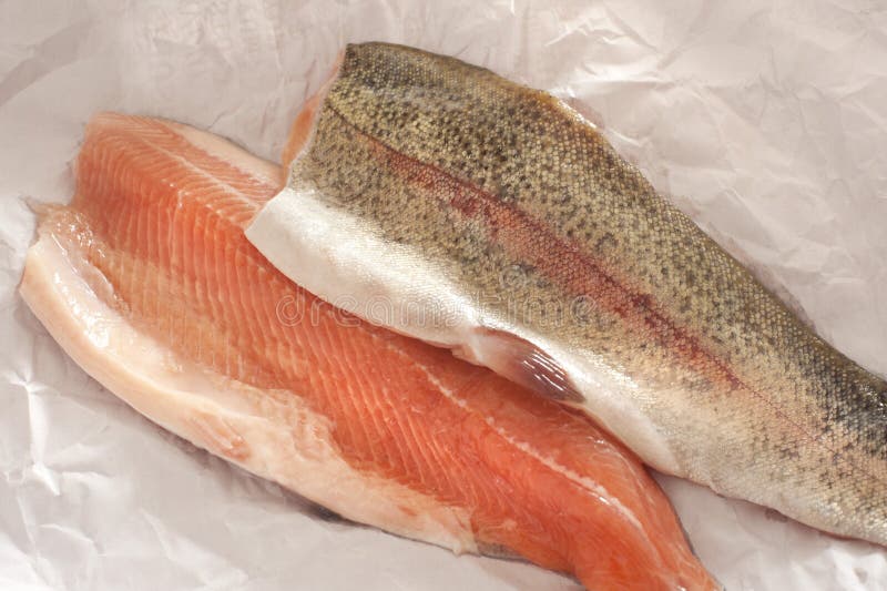 2 Fillets of Rainbow Trout on a Slate Background Stock Photo - Image of salt, le