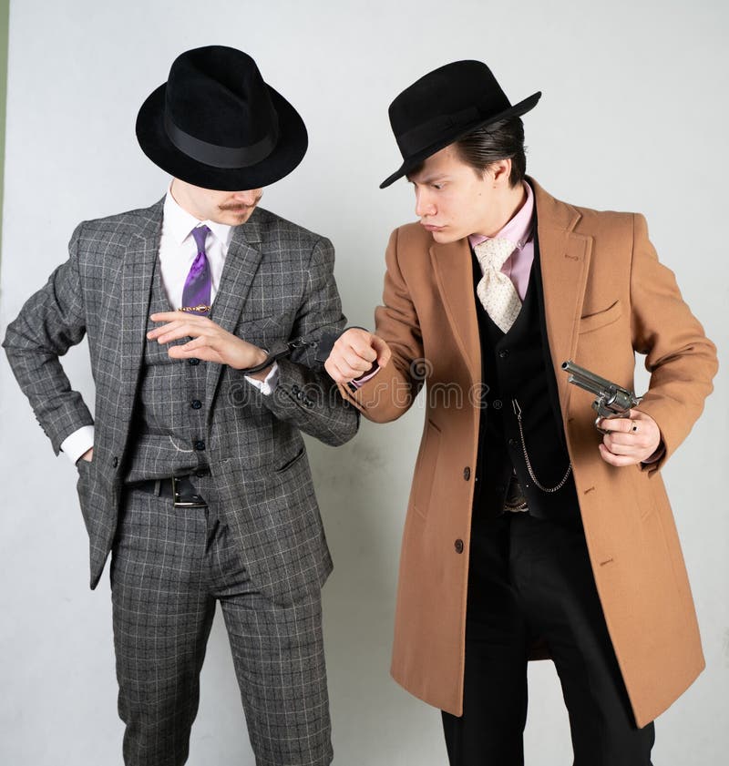 Two Friends Dressed in Vintage Clothes and Depict Retro Detectives and  Spies in English Classic Style on a White Studio Background Stock Image -  Image of bloodhound, depict: 142919863