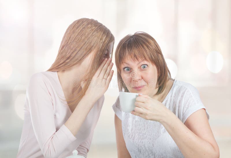 Two friends are gossiping royalty free stock photo Two friends are gossiping royalty free stock photo