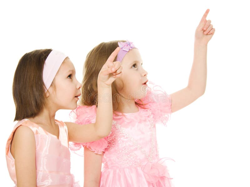 Two friends in a pink dress looking up