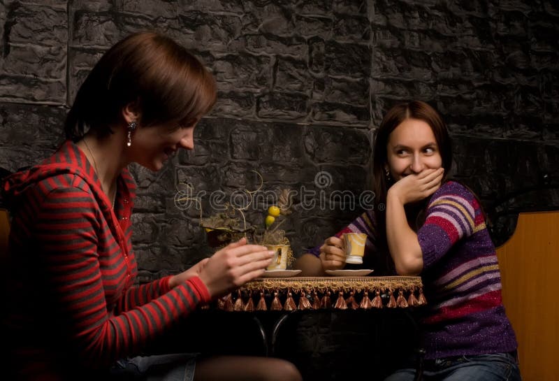 Two friends in a restaurant