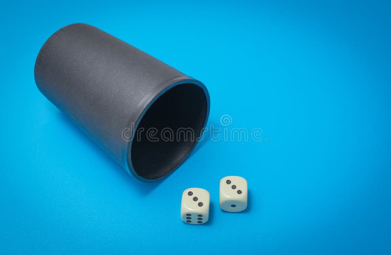 Game dice abstract. Two game dice number double three abstract on a blue background