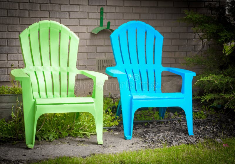 Two Garden Deck Chairs Blue and Green in Pleasant Garden Spot Stock