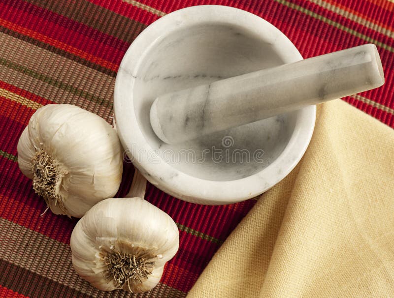 Two Garlic Bulbs with Mortar and Pestle Stock Photo Image of