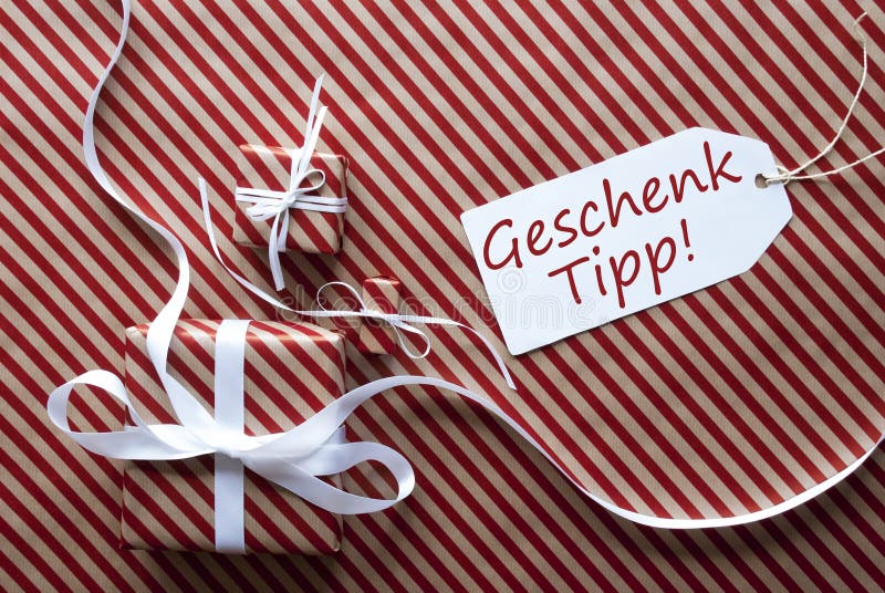 Two Gifts with Label, Geschenk Tipp Means Gift Tip Stock Photo Image