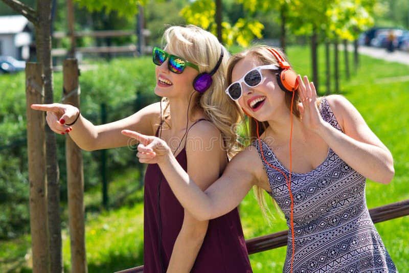 Two girl friends having fun stock photography Two girl friends having fun stock photography