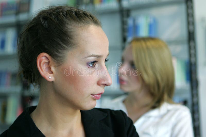 Two girls looking away