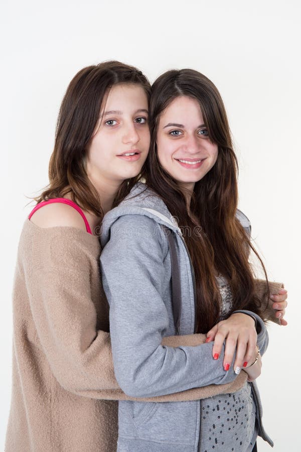 Two Lesbians Sisters Twins Beautiful Curly Blonde Young Woman In Stylish Dress Holding Hands In