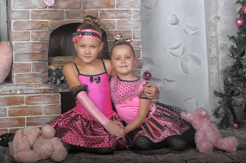 Two Girls in Pink for Christmas Stock Photo - Image of beauty, cute ...