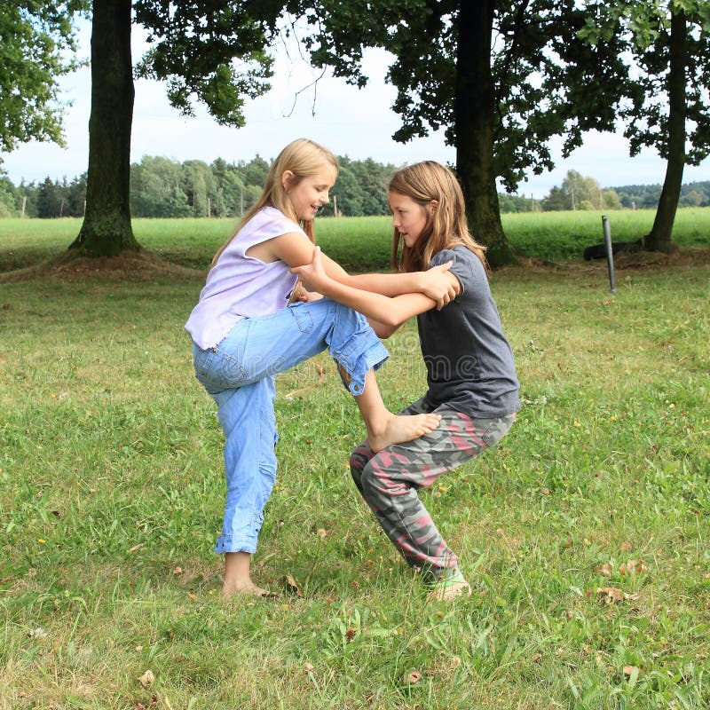 Two Girls Playing With Each Other